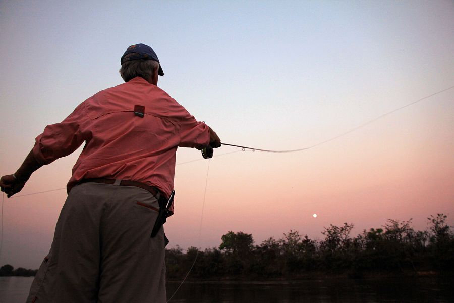 Ed_Kozlowski_pushing_a_long_cast_at_last_light