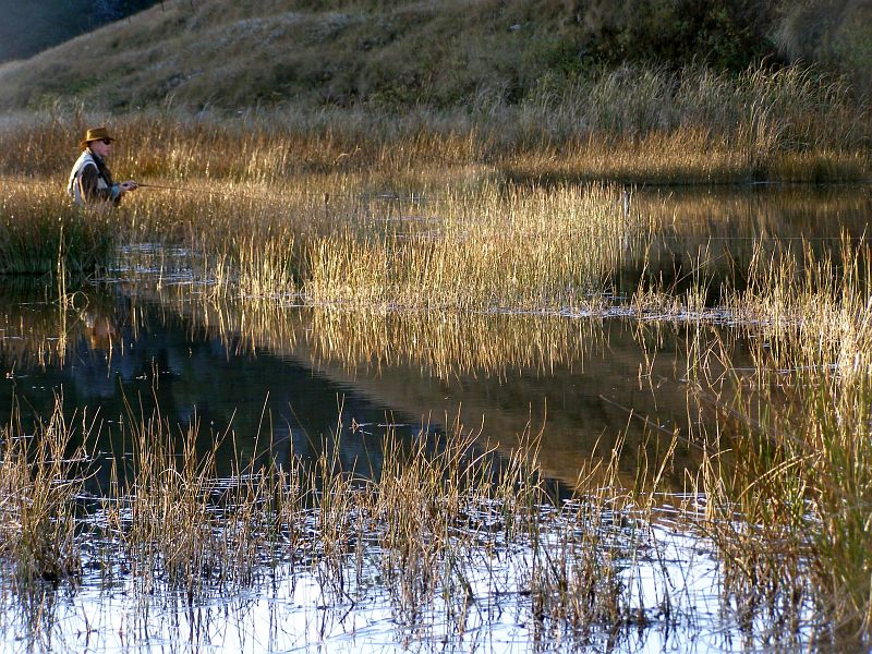 Paul_De_Wet_fishing_Cliff_Dam_by_Andrew_Fowler